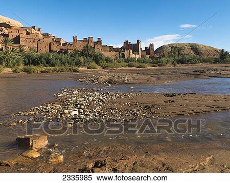Brown buildings along a river View Large Photo Image Stock Photography - Brown buildings along a river. Fotosearch