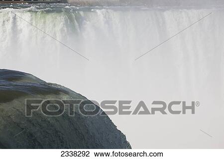 Stock Image - Close up of Niagara Falls; Niagara Falls, New York, United States of America. Fotosearch