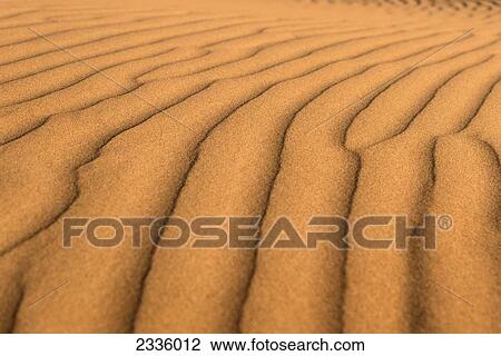Stock Image - Close up of ripples in the sand. Fotosearch