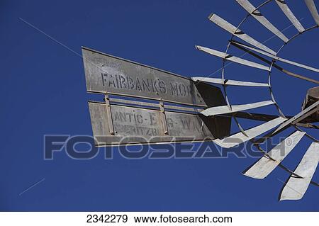 Stock Photo - Close up of windmill blades against a blue sky; Klein-Aus Vista, Namibia. Fotosearch