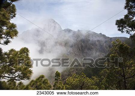 Stock Photography - Cloud shrouding the upper rim, Caldera de Taburiente National Park; Canary Islands, Spain. Fotosearch