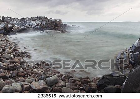 Stock Photography - Crashing waves on Lake Superior; Thunder Bay, Ontario, Canada. Fotosearch