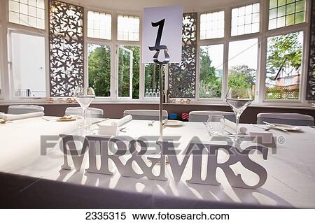 Stock Photography - Detail of top table at wedding ceremony reception; Bournemouth, Dorset, England. Fotosearch