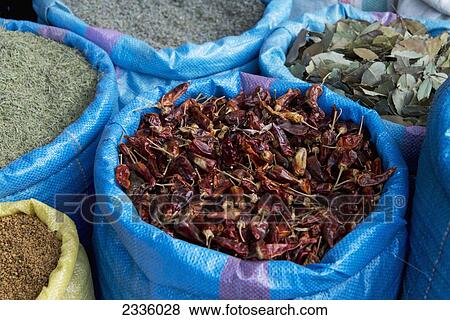Stock Photo - Dried spices in blue bags. Fotosearch