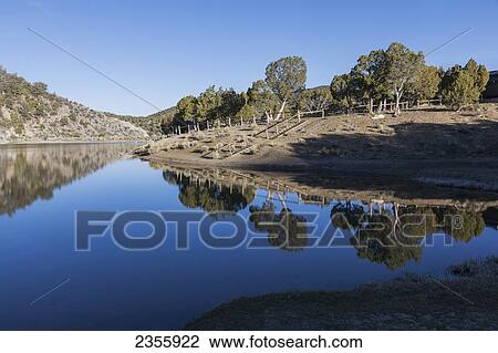 Stock Image - Early morning sunny day at Cave Lake State Park, Lake View Campground, near Ely; Nevada, United States of America. Fotosearch