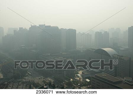 Haze over a busy city View Large Photo Image Stock Image - Haze over a busy city. Fotosearch