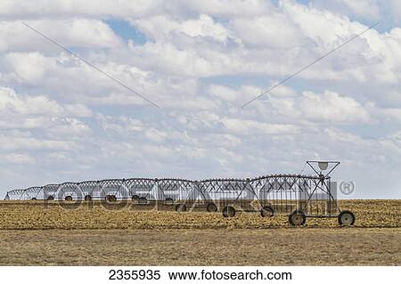 Irrigation system using well water to water crops in the former dust bowl area of the Oklahoma panhandle near Boise City on Highway 56; Oklahoma, United States of America View Large Photo Image Stock Photography - Irrigation system using well water to water crops in the former dust bowl area of the Oklahoma panhandle near Boise City on Highway 56; Oklahoma, United States of America. Fotosearch