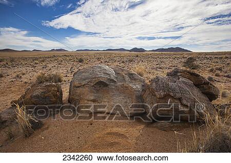 Large rocks in the desert; Klein-Aus Vista, Namibia View Large Photo Image Stock Image - Large rocks in the desert; Klein-Aus Vista, Namibia. Fotosearch