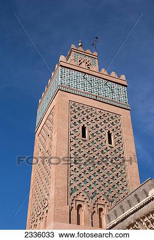 Stock Image - Low angle view of a tower against a blue sky. Fotosearch