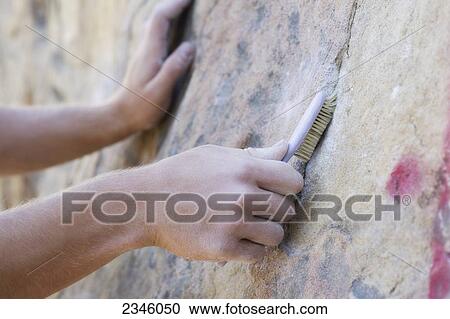 Man preparing to rock climb; Santa Barbara, California, United States of America View Large Photo Image Stock Image - Man preparing to rock climb; Santa Barbara, California, United States of America. Fotosearch