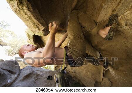 Man rock climbing (bouldering) at Lizard's Mouth; Santa Barbara, California, United States of America View Large Photo Image Picture - Man rock climbing (bouldering) at Lizard's Mouth; Santa Barbara, California, United States of America. Fotosearch
