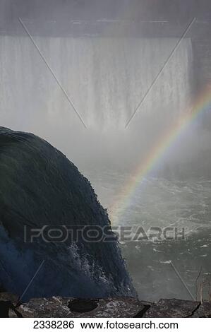 Niagara Falls with rainbow and mist; Niagara Falls, New York, United States of America View Large Photo Image Stock Photograph - Niagara Falls with rainbow and mist; Niagara Falls, New York, United States of America. Fotosearch