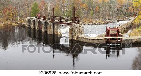 Stock Photo - Old dam in autumn. Fotosearch