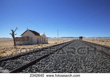 Stock Image - Old train station and abandoned house; Garub, Namibia. Fotosearch