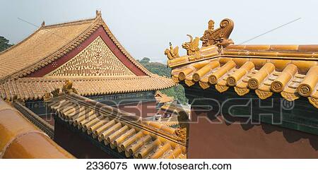 Stock Photography - Ornate gold detail on a roofline. Fotosearch