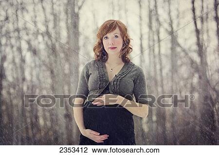 Stock Image - Portait of a pregnant woman; Edmonton, Alberta, Canada. Fotosearch