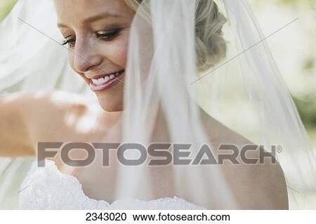 Stock Image - Portrait of a bride; Pemberton, British Columbia, Canada. Fotosearch