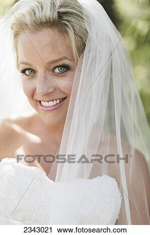 Stock Image - Portrait of a bride; Pemberton, British Columbia, Canada. Fotosearch