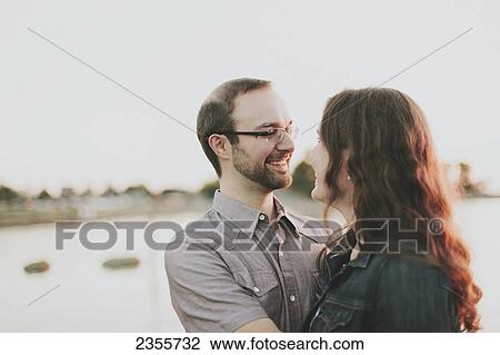 Stock Image - Portrait of a couple; Crescent Beach, British Columbia, Canada. Fotosearch