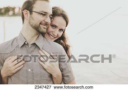 Stock Photo - Portrait of a couple; Crescent Beach, British Columbia, Canada. Fotosearch