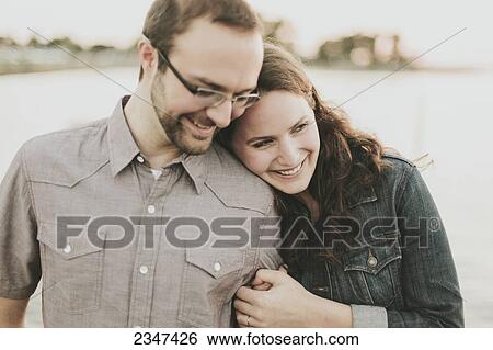 Stock Photograph - Portrait of a couple; Crescent Beach, British Columbia, Canada. Fotosearch