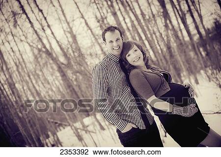 Portrait of a couple during pregnancy; Edmonton, Alberta, Canada View Large Photo Image Stock Image - Portrait of a couple during pregnancy; Edmonton, Alberta, Canada. Fotosearch