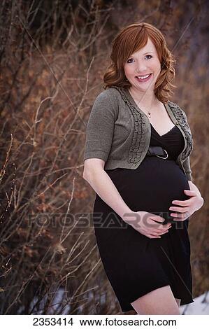 Portrait of a pregnant woman; Edmonton, Alberta, Canada View Large Photo Image Picture - Portrait of a pregnant woman; Edmonton, Alberta, Canada. Fotosearch