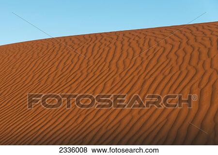 Ripples in the sand and a blue sky View Large Photo Image Stock Photo - Ripples in the sand and a blue sky. Fotosearch
