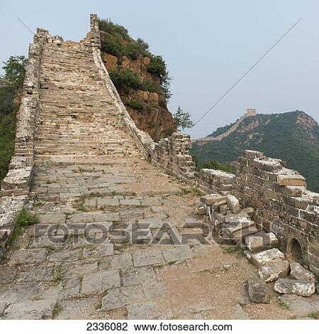 Stock Image - Ruins of the Great Wall of China; China. Fotosearch
