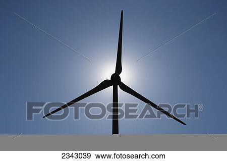 Stock Photo - Silhouette of a wind turbine; St. Remi, Quebec, Canada. Fotosearch