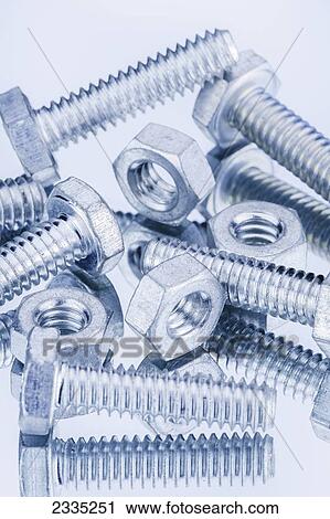 Silver screws and bolts on a white background View Large Photo Image Stock Image - Silver screws and bolts on a white background. Fotosearch