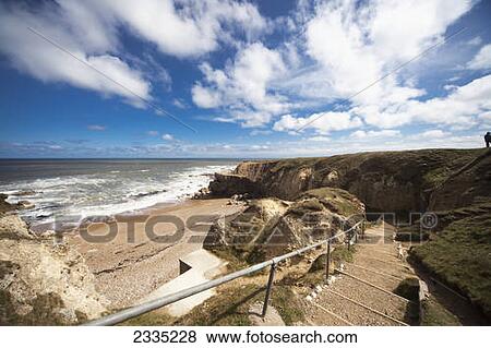 Stock Photo - Steps leading down to the beach along the coast; South Shields, Tyne and Wear, England. Fotosearch