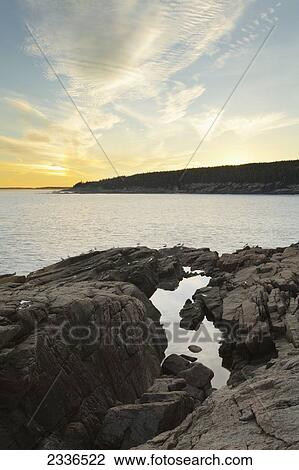 Sunset on a rocky shoreline, Acadia National Park; Maine, United States of America View Large Photo Image Stock Image - Sunset on a rocky shoreline, Acadia National Park; Maine, United States of America . Fotosearch