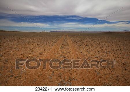 Tire tracks in the dirt on a desert landscape; Klein-Aus Vista, Namibia View Large Photo Image Stock Image - Tire tracks in the dirt on a desert landscape; Klein-Aus Vista, Namibia. Fotosearch