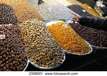 Variety of dried fruit and nuts at the market View Large Photo Image Stock Image - Variety of dried fruit and nuts at the market. Fotosearch