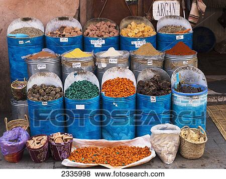 Various spices and condiments in containers on display for sale View Large Photo Image Stock Photo - Various spices and condiments in containers on display for sale. Fotosearch