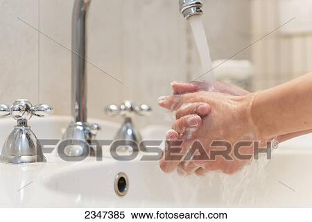 Washing hands; Sestri Levante, Liguria, Italy View Large Photo Image Stock Photography - Washing hands; Sestri Levante, Liguria, Italy. Fotosearch