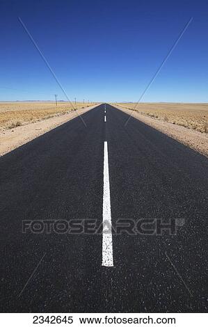 White line on a paved road in the desert; Garub, Namibia View Large Photo Image Stock Photography - White line on a paved road in the desert; Garub, Namibia. Fotosearch