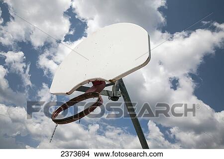 A Broken Basketball Hoop; Ontario, Canada View Large Photo Image Picture - A Broken Basketball Hoop; Ontario, Canada. Fotosearch