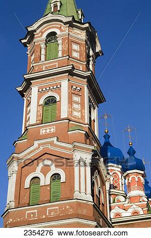 A Church Tower With Green Shutters; Riga, Latvia View Large Photo Image Stock Photograph - A Church Tower With Green Shutters; Riga, Latvia. Fotosearch