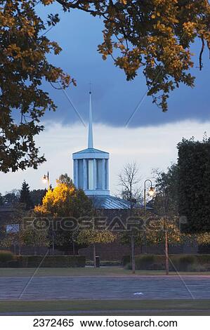Stock Photography - A Church With A Cross On The Top Of A Spire; Hertfordshire, England. Fotosearch