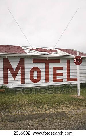 A Motel With The Sign Written In Large Letters On The Side Of The Building And A Canadian Flag On The Roof; Broadview, Saskatchewan, Canada View Large Photo Image Stock Image - A Motel With The Sign Written In Large Letters On The Side Of The Building And A Canadian Flag On The Roof; Broadview, Saskatchewan, Canada. Fotosearch