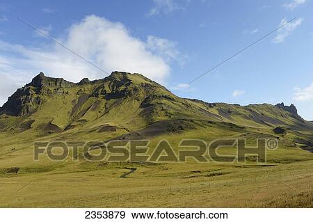 Stock Photo - A Mountain Overlooking The Village Of Vik; Vik, Vestur-Skaftafellssysla, Iceland. Fotosearch