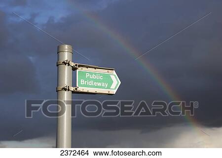 A Rainbow Through The Storm Clouds And A Sign To Public Bridleway; Hertfordshire, England View Large Photo Image Picture - A Rainbow Through The Storm Clouds And A Sign To Public Bridleway; Hertfordshire, England. Fotosearch