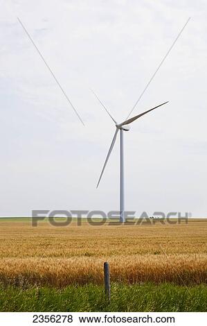 Stock Photo - A Wind Turbine In A Field; Alberta, Canada. Fotosearch
