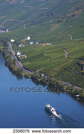 Boats In The River Near Bernkastel-Kues, A Wine Region In Mosel Valley; Rhineland-Palatinate, Germany View Large Photo Image Stock Photo - Boats In The River Near Bernkastel-Kues, A Wine Region In Mosel Valley; Rhineland-Palatinate, Germany. Fotosearch