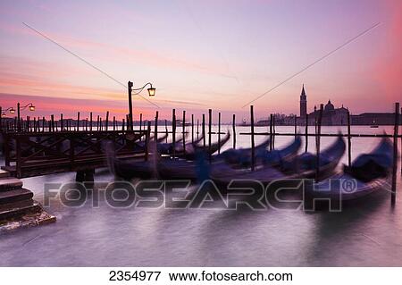 Stock Photo - Boats Mooring At Dawn; Venice, Italy. Fotosearch