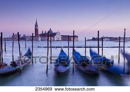 Boats Mooring In The Water At Dusk; Venice, Italy View Large Photo Image Stock Photo - Boats Mooring In The Water At Dusk; Venice, Italy. Fotosearch