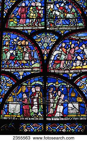 Stock Image - Colourful Stained Glass Window In Canterbury Cathedral; Canterbury, Kent, England. Fotosearch