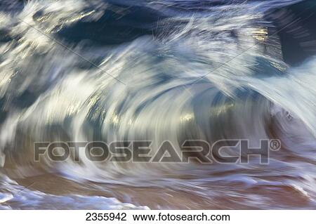 Stock Image - Crashing Wave; Oahu, Hawaii, United States Of America. Fotosearch